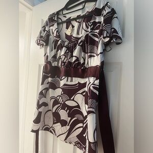 Cute purple and white satin top with purple slimming tie back ribbon